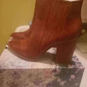 Brand New womans size 10 pointed toe slip on booties/Block heel Faux leather